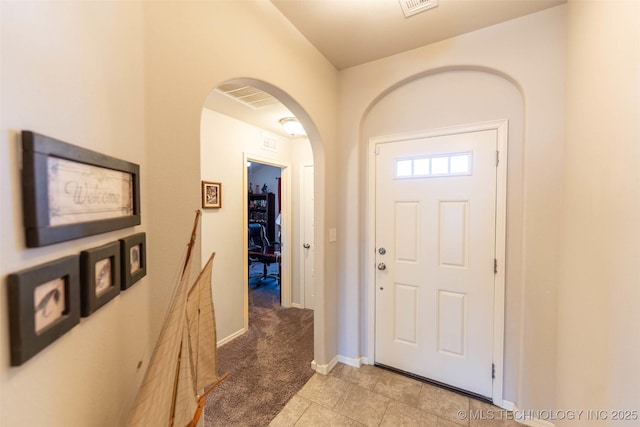 11105 N 145th E Pl, Owasso, OK 74055 - foyer featuring arched walkways and light tile patterned floors