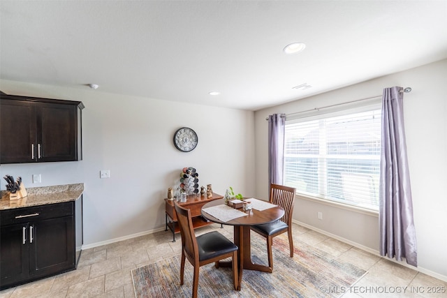 11105 N 145th E Pl, Owasso, OK 74055 - dining space featuring baseboards and recessed lighting