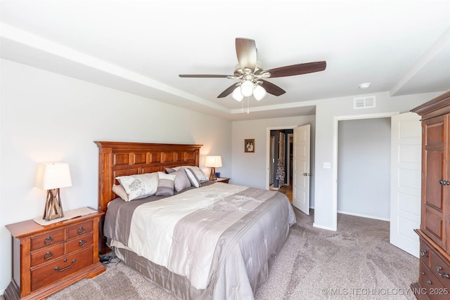 11105 N 145th E Pl, Owasso, OK 74055 - bedroom with light colored carpet and a ceiling fan