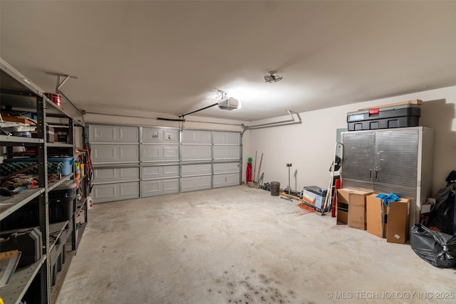 11105 N 145th E Pl, Owasso, OK 74055 - garage featuring a garage door opener
