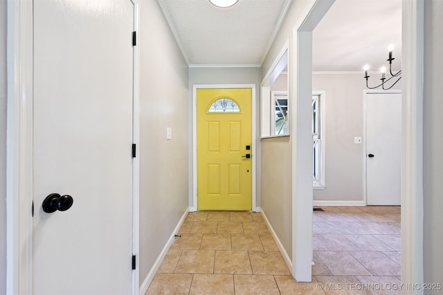 4643 E 59th St, Tulsa, OK 74135 - foyer with a chandelier, crown molding, and light tile patterned flooring