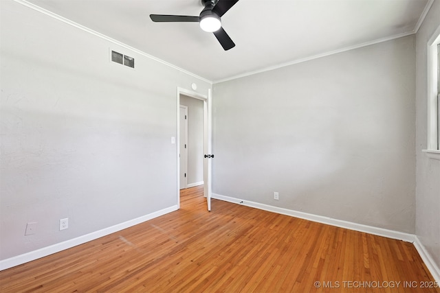 4643 E 59th St, Tulsa, OK 74135 - spare room with ornamental molding, a ceiling fan, and light wood-style floors