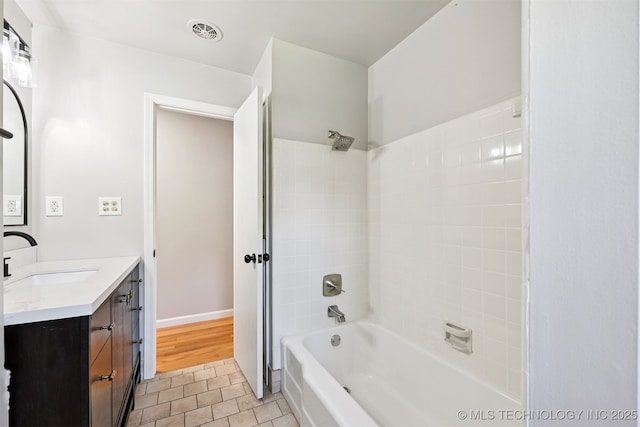 4643 E 59th St, Tulsa, OK 74135 - full bathroom with vanity and shower / washtub combination
