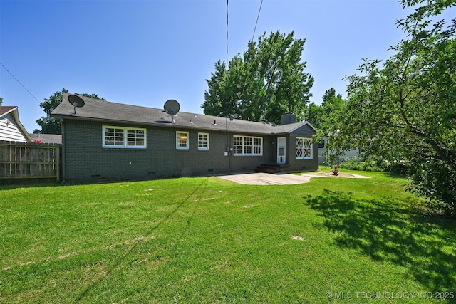 4643 E 59th St, Tulsa, OK 74135 - rear view of property featuring crawl space, a patio, brick siding, and a chimney