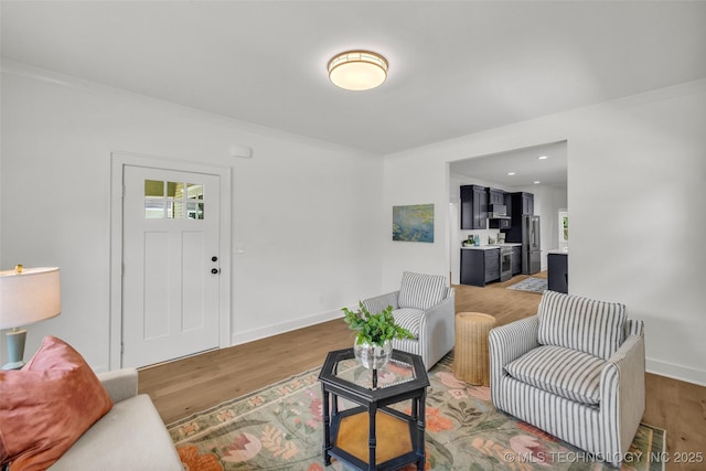 1524 N Main St, Tulsa, OK 74106 - living area with ornamental molding and light wood-type flooring