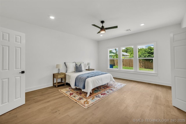1524 N Main St, Tulsa, OK 74106 - bedroom with light wood-type flooring, recessed lighting, and ceiling fan