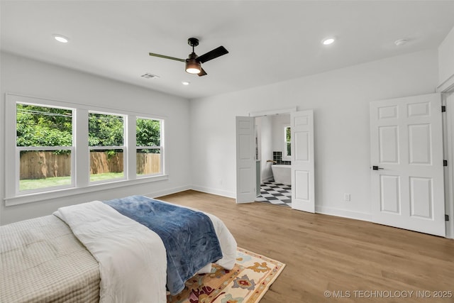 1524 N Main St, Tulsa, OK 74106 - bedroom featuring light wood-style floors, recessed lighting, a ceiling fan, and ensuite bathroom