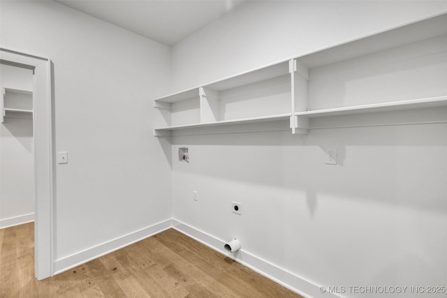 1524 N Main St, Tulsa, OK 74106 - washroom featuring electric dryer hookup, wood finished floors, and washer hookup
