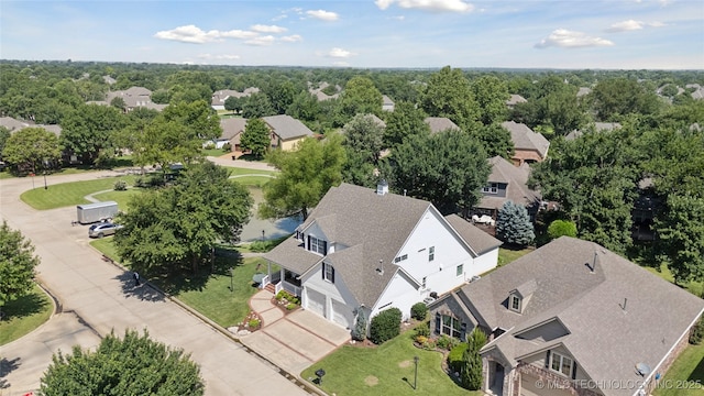 8002 E Galveston Pl, Broken Arrow, OK 74014 - aerial view of residential area with a tree filled landscape