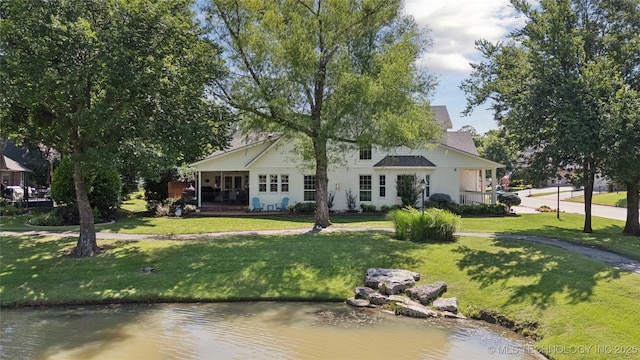 8002 E Galveston Pl, Broken Arrow, OK 74014 - back of house featuring a lawn and covered porch