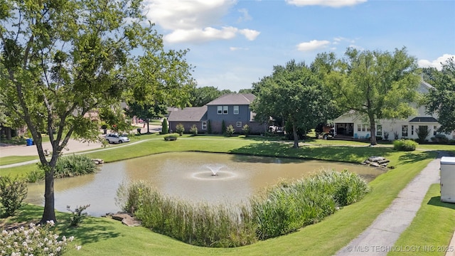 8002 E Galveston Pl, Broken Arrow, OK 74014 - view of community with a water view and a lawn