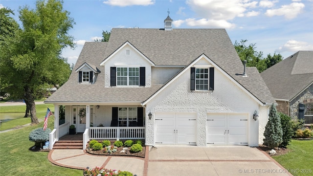 8002 E Galveston Pl, Broken Arrow, OK 74014 - traditional-style house with a shingled roof, covered porch, concrete driveway, and a front lawn
