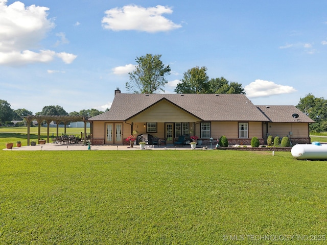 5621 E Hunter Ln, Claremore, OK 74019 - back of house with a pergola, a lawn, a patio area, a chimney, and a shingled roof