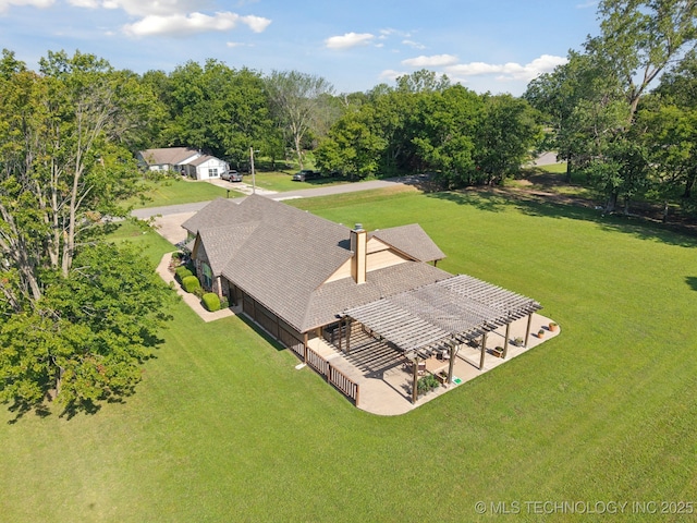 5621 E Hunter Ln, Claremore, OK 74019 - aerial view of property and surrounding area with a tree filled landscape
