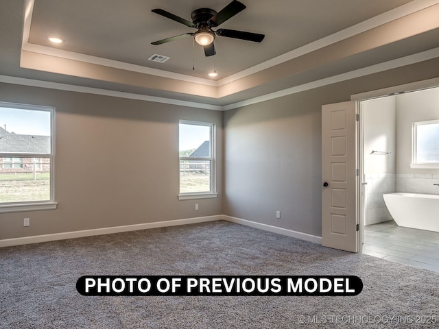 7010 E 137th St, Collinsville, OK 74021 - carpeted empty room featuring a raised ceiling, ornamental molding, a ceiling fan, and recessed lighting