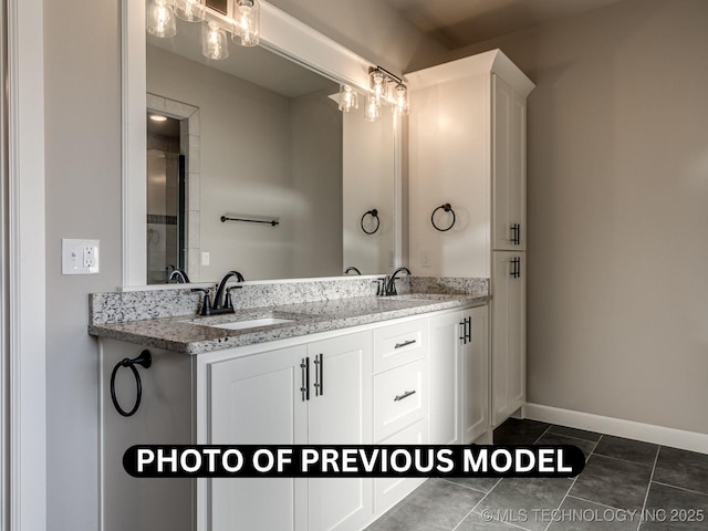 7010 E 137th St, Collinsville, OK 74021 - full bath with double vanity and tile patterned flooring
