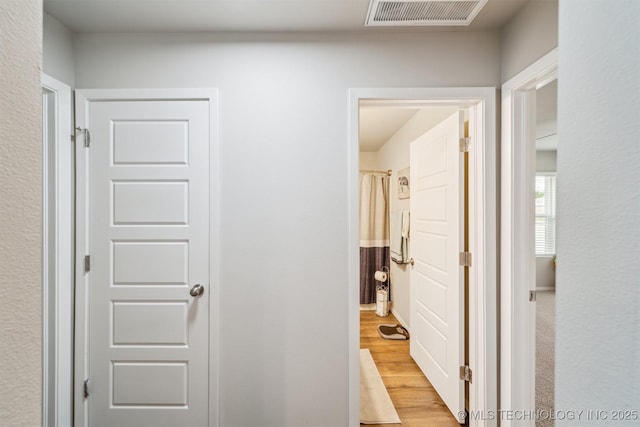 1111 W Cheyenne Ln, Claremore, OK 74019 - hall featuring light wood-type flooring