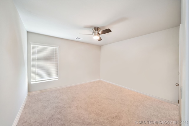 1111 W Cheyenne Ln, Claremore, OK 74019 - carpeted empty room featuring ceiling fan and baseboards