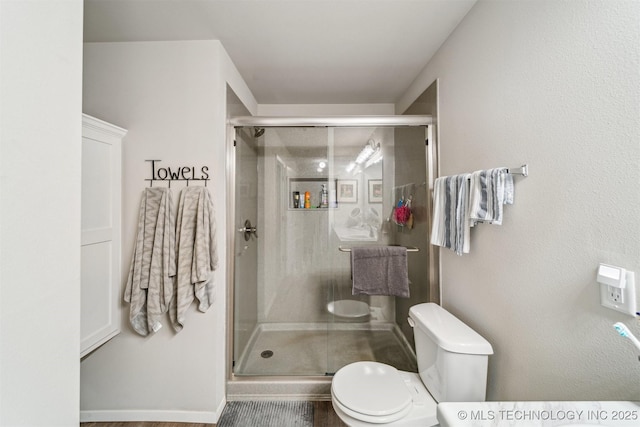 1111 W Cheyenne Ln, Claremore, OK 74019 - full bathroom with toilet and a stall shower