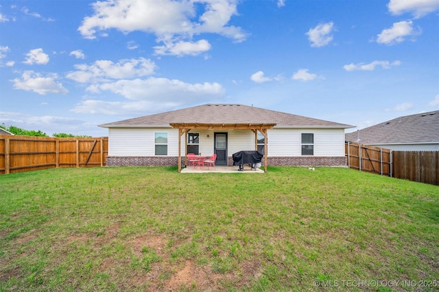 1111 W Cheyenne Ln, Claremore, OK 74019 - back of house featuring a patio area, a fenced backyard, and brick siding