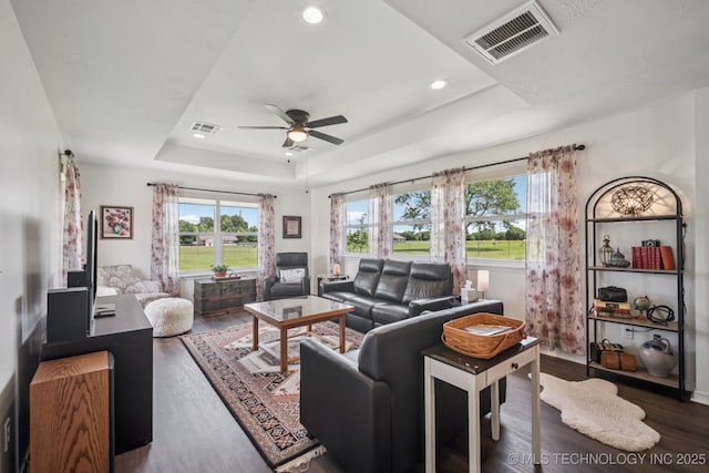 1120 S Sequoyah Dr, Oologah, OK 74053 - living area featuring a raised ceiling, wood finished floors, ceiling fan, and recessed lighting