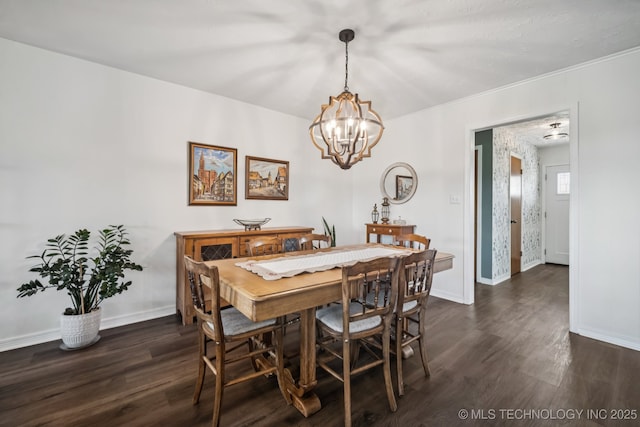1120 S Sequoyah Dr, Oologah, OK 74053 - dining area featuring dark wood-type flooring, a chandelier, and crown molding
