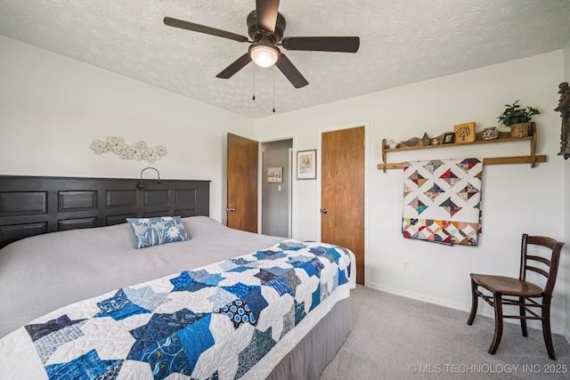 1120 S Sequoyah Dr, Oologah, OK 74053 - bedroom featuring carpet, a textured ceiling, and a ceiling fan