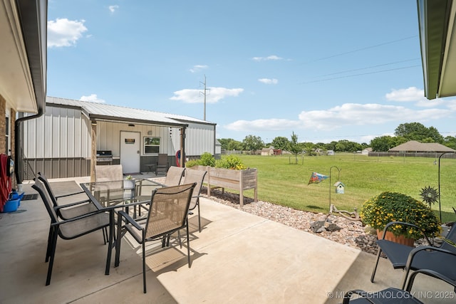 1120 S Sequoyah Dr, Oologah, OK 74053 - view of patio featuring outdoor dining area and a grill