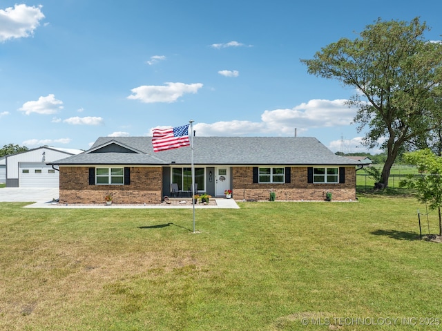 1120 S Sequoyah Dr, Oologah, OK 74053 - single story home with a garage, brick siding, roof with shingles, and concrete driveway