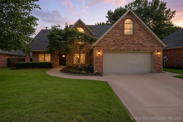 5428 E 88th St, Tulsa, OK 74137 - traditional home with a garage, driveway, and a lawn