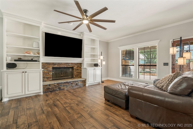 5428 E 88th St, Tulsa, OK 74137 - living area with ceiling fan, ornamental molding, dark wood finished floors, a fireplace, and built in features