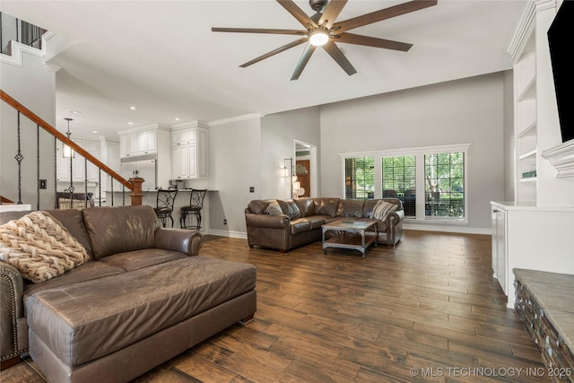5428 E 88th St, Tulsa, OK 74137 - living area with ceiling fan, stairway, dark wood-type flooring, recessed lighting, and crown molding