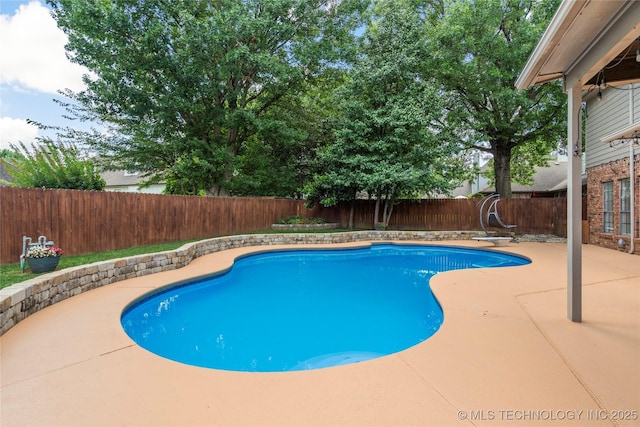 5428 E 88th St, Tulsa, OK 74137 - view of pool featuring a fenced backyard, a patio area, and a diving board