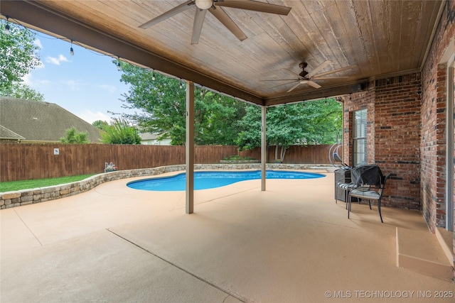 5428 E 88th St, Tulsa, OK 74137 - view of pool featuring ceiling fan, a fenced backyard, and a patio area