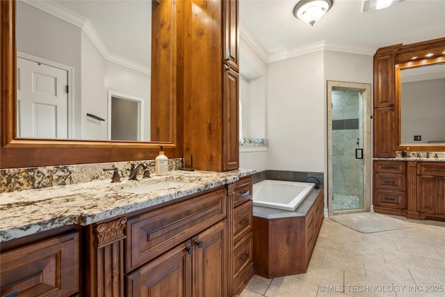 5428 E 88th St, Tulsa, OK 74137 - bathroom featuring a stall shower, vanity, a garden tub, crown molding, and tile patterned flooring