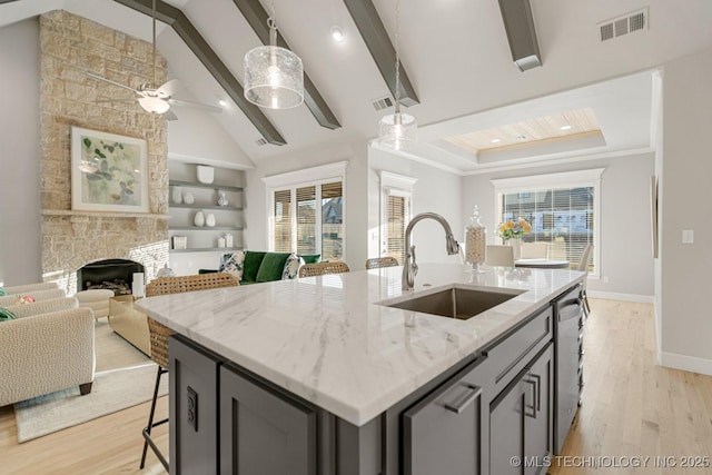 3905 S Elder Blvd, Broken Arrow, OK 74012 - kitchen featuring a ceiling fan, open floor plan, light wood finished floors, stainless steel dishwasher, and recessed lighting