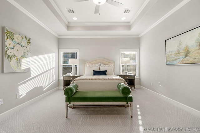 3905 S Elder Blvd, Broken Arrow, OK 74012 - carpeted bedroom with a tray ceiling, crown molding, and a ceiling fan