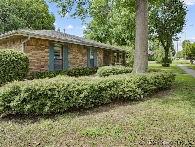 301 S Byrd, Coalgate, OK 74538 - ranch-style house with a front lawn, a shingled roof, and brick siding