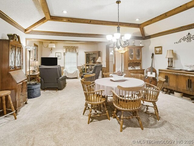 301 S Byrd, Coalgate, OK 74538 - carpeted dining area with a chandelier and beam ceiling