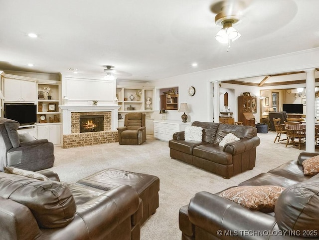 301 S Byrd, Coalgate, OK 74538 - living area featuring a ceiling fan, ornamental molding, carpet flooring, a fireplace, and recessed lighting