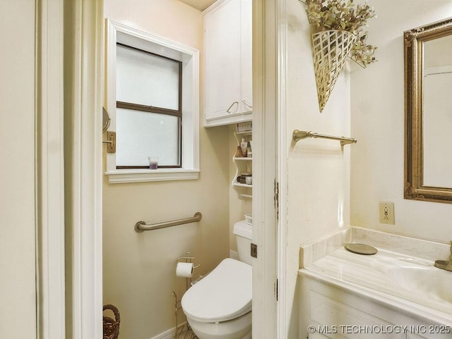 301 S Byrd, Coalgate, OK 74538 - bathroom with vanity and toilet