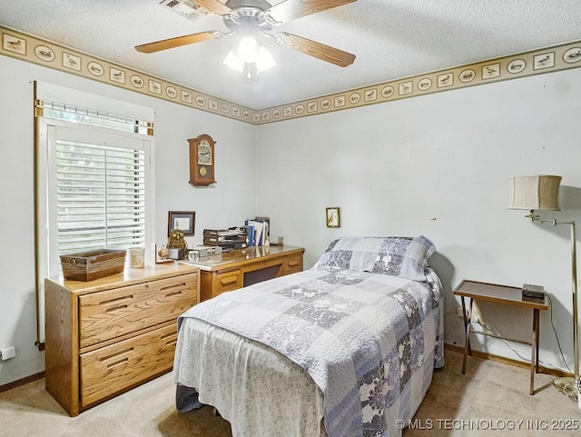 301 S Byrd, Coalgate, OK 74538 - bedroom with light carpet, a textured ceiling, and ceiling fan