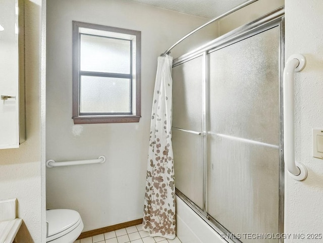 301 S Byrd, Coalgate, OK 74538 - bathroom featuring shower / tub combo with curtain and tile patterned flooring
