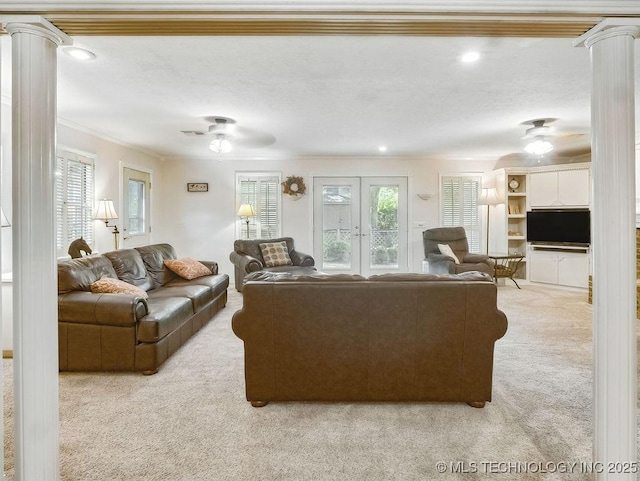 301 S Byrd, Coalgate, OK 74538 - living room with carpet flooring, crown molding, a ceiling fan, ornate columns, and recessed lighting