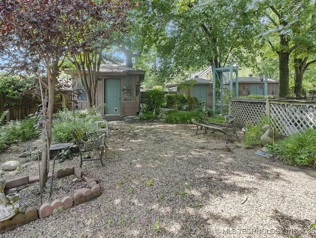 301 S Byrd, Coalgate, OK 74538 - view of yard featuring an outdoor structure
