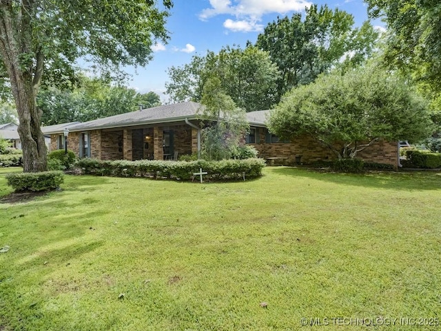 301 S Byrd, Coalgate, OK 74538 - view of front of house with a front yard and brick siding
