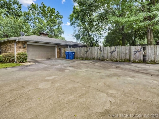 301 S Byrd, Coalgate, OK 74538 - garage featuring concrete driveway