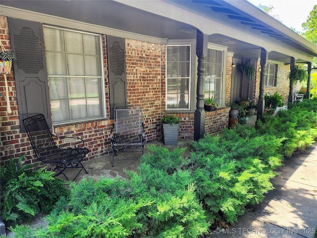 5135 S Marion Pl, Tulsa, OK 74135 - doorway to property featuring brick siding and covered porch