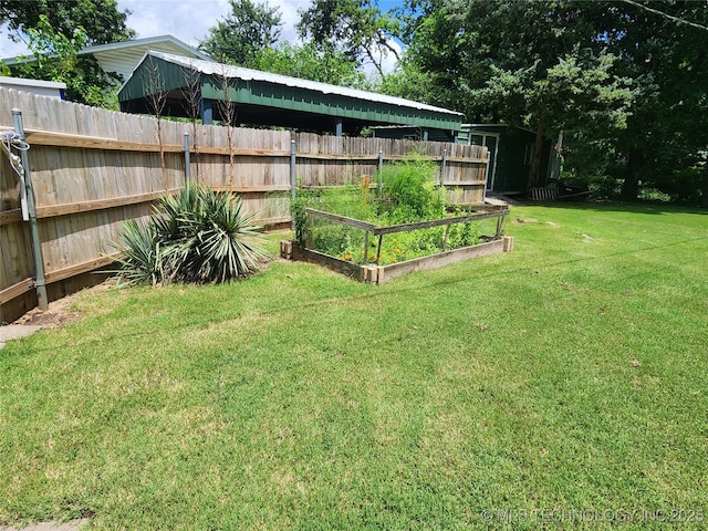 5135 S Marion Pl, Tulsa, OK 74135 - view of yard with a garden