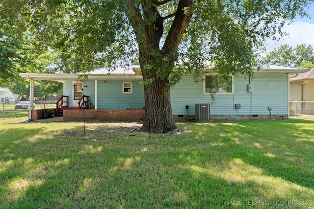 507 S Thompson, Vinita, OK 74301 - rear view of property featuring crawl space, a metal roof, and a porch